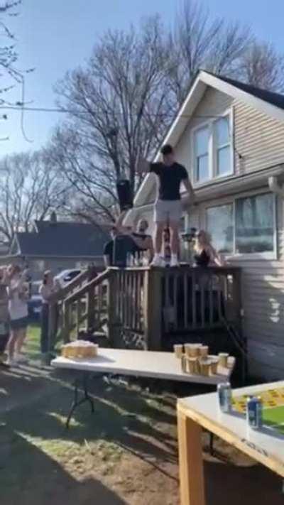 Guy tries to land on table, lands on ground instead