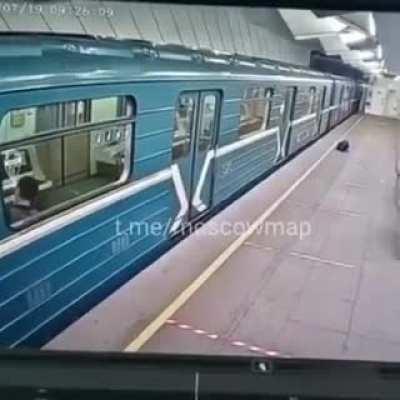 Woman jumps in front of a train and comes back.
