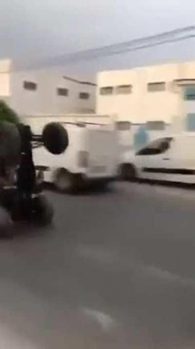 Doing a wheelie in a quad bike