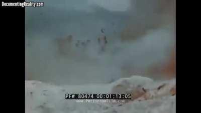 Very NSFW EXTREALY GRAPHIC WARNING, American soldier clearing Japanese soldier out of a hole using hand grenade in WW2