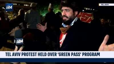 Israeli protester advocating against the 'Green Pass' program and defending the rights of unvaccinated persons: « the Nazi's were also 