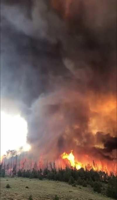 A smoke vortex from a fire burning in Moffat County