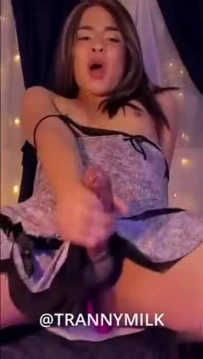 Cutie is amazed by her own milk spray