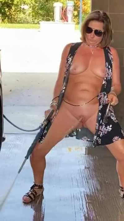 Cougar Washing Her Car