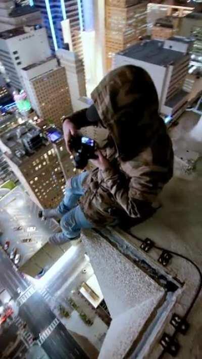 My friend @high_vis getting shots on a dallas roof [OC]