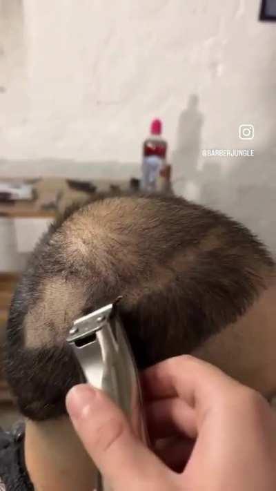 Guy asks the barber to make him look like he’s in the NBA.