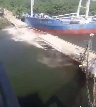 The ship is larger than the bridge.