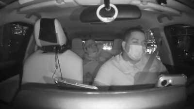 Idiot in the rear seat of a car [loud]