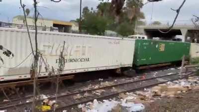 Leftover trash from train robberies derails 17 train cars in Los Angeles