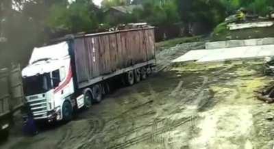 Man dies after head crushed between two trucks while trying to stop a rolling truck with his bare hands