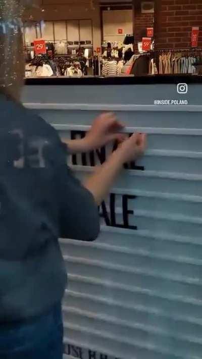 Store signage [loud music]