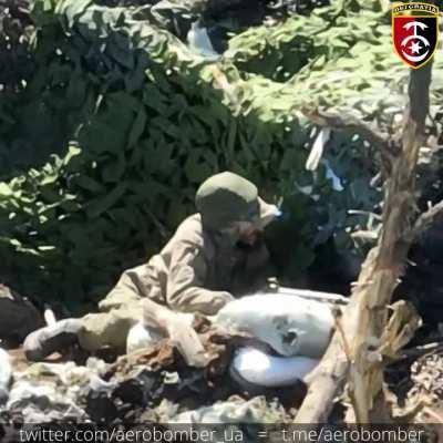 UA Drone operator from 30th brigade's shock aerial reconnaissance dropping explosive on RU soldier in trench