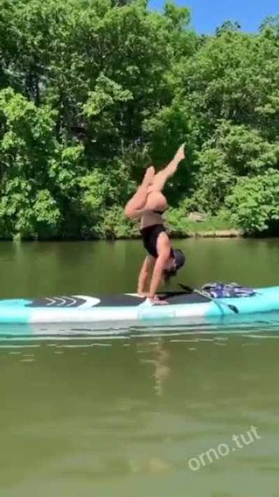 Hmc while I try to do a trick on a paddle board