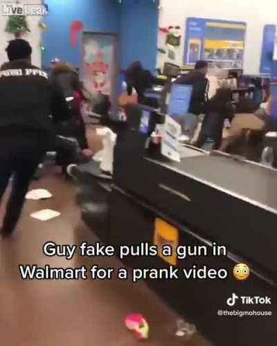 Guy pulls a fake gun for a prank