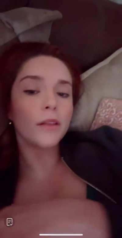 Redhead cleavage lie on bed 