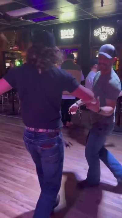 Just a couple bros getting down on the dance floor
