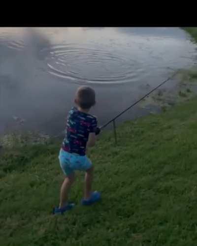 Just fishing with dad on a calm summer evening