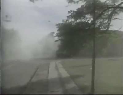 Frontloader destroys prison wall in an attempt of a prison break.