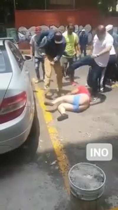 Tries to steal a ladies cell phone, gets beaten and stripped naked.