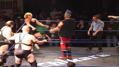 The late, great Larry Sweeney stops mid-match to dance to his opponent's classic theme song