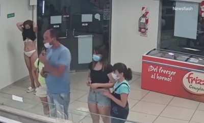 to use her dress as a mask