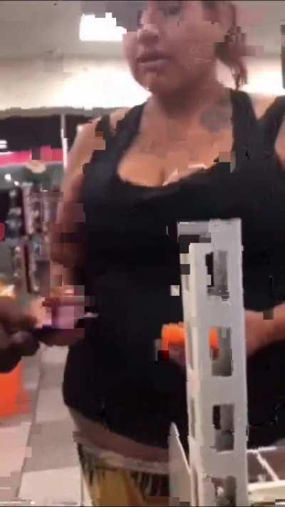 Lady tries to buy merchandise with a toy credit card.