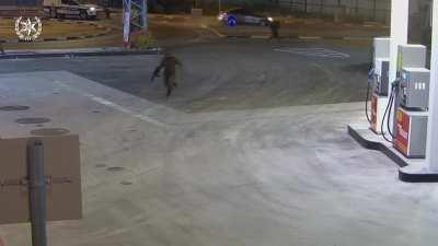 An israeli officer respond to a call on a gang trying to lit up a gas station