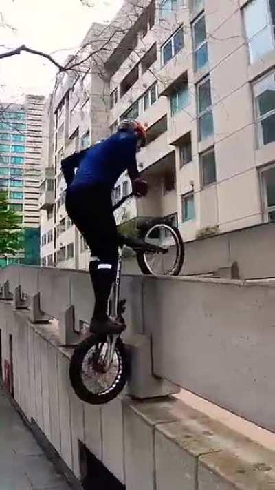 Dude does some hard to pull off skills on his Bike