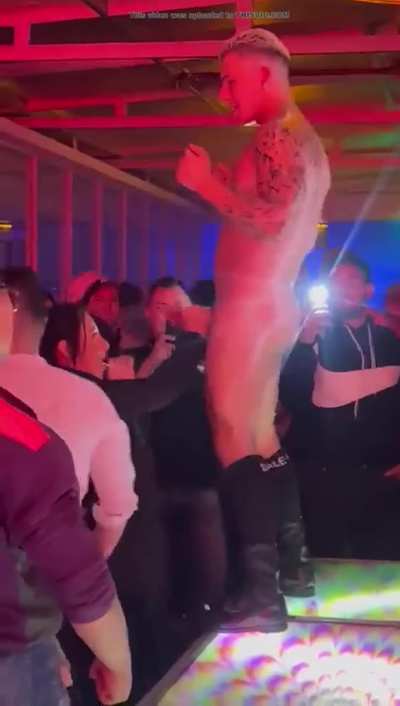 Latina giving stripper on stage a handjob