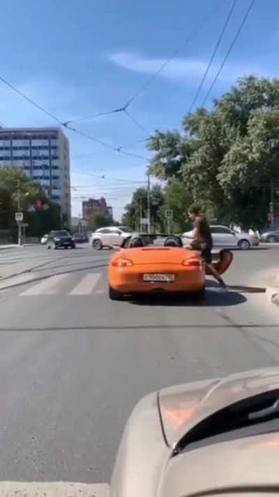 Could have been scripted but maybe they were trying to film the car...?