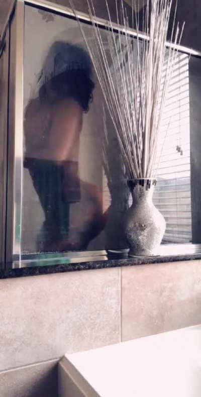 Clapping her ass in shower