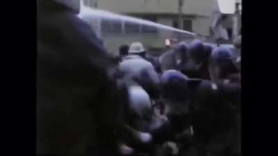 An old-school riot in 1985 Japan, between Japanese far-leftist protesters and State Riot Police clashing over a public land dispute.