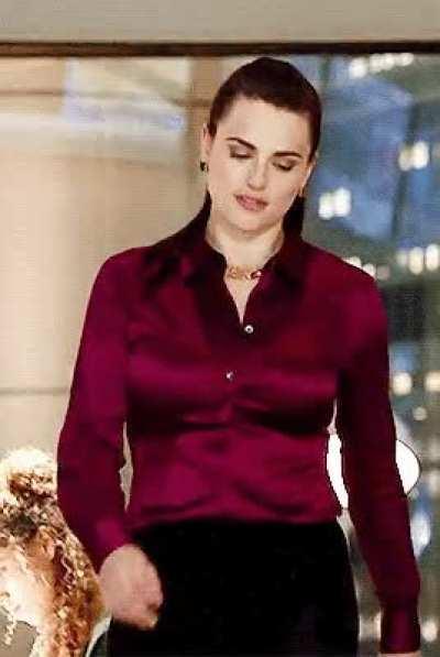 Those buttons are working overtime to keep Katie McGrath’s tits from popping out