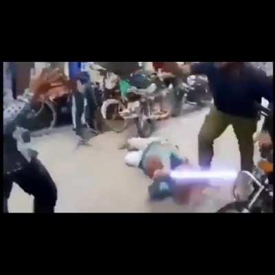A fight between two shop owners and their family members Credits to the editor for putting in the sabers in place of wood sticks