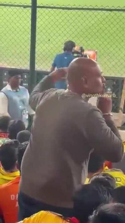 A spectator in Uppal Stadium silencing the crowd with his poster