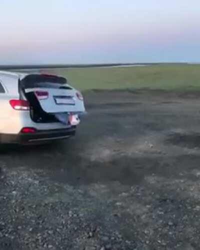 To close the trunk while jumping in at the same time