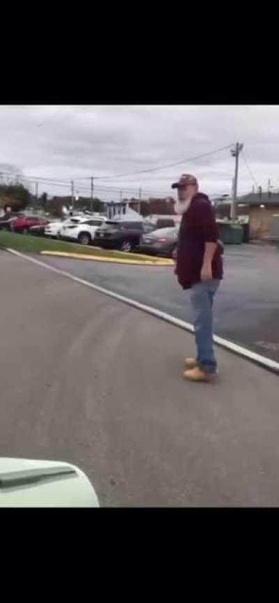 Racist Trump supporter repeatedly screamed the n word at a rally Saturday then proceeds to confront protestors and assault a veteran while they were trying to leave.