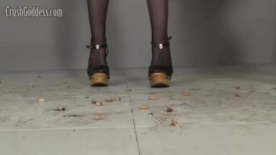 Girls crushing worm while dancing