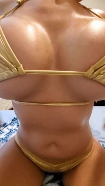 My huge tits in a golden bikini