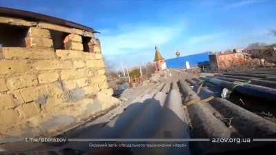 POV actions of destroying Russian armoured vehicle in Mariupol from Ukrainian Armed Forces.