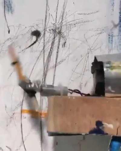 Shitty art-making robot.