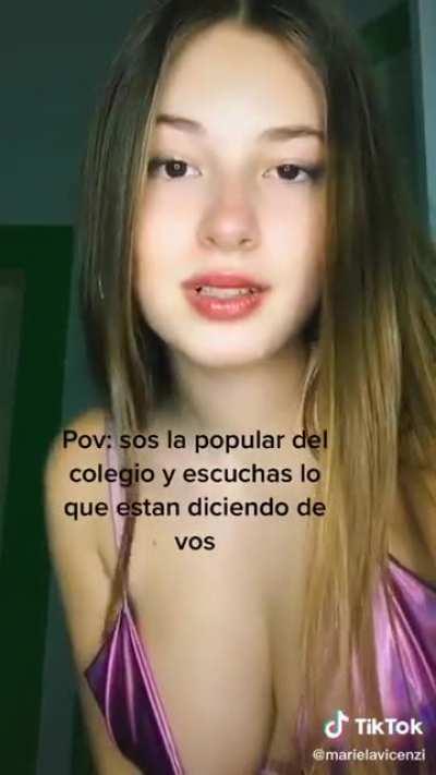 She's so close to falling out of her top