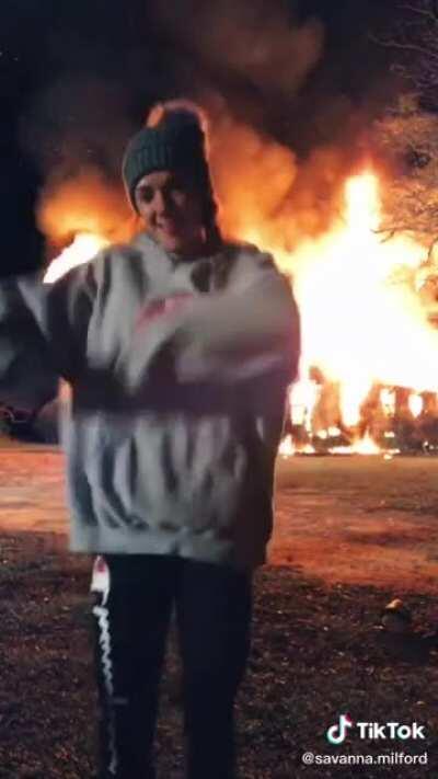 Kid TikTok Dances in Front of her burning house