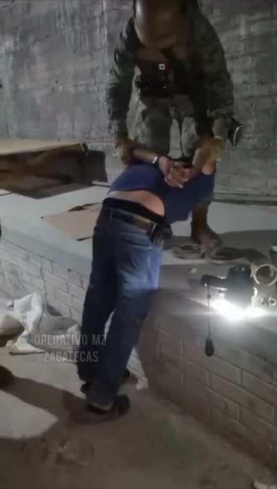 Operativa MZ spanking a man. unsure why