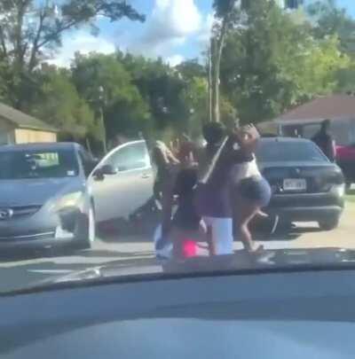 These people getting run over by a car