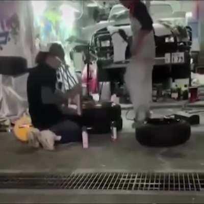 Guy puts his foot on the tire and flies a little bit.