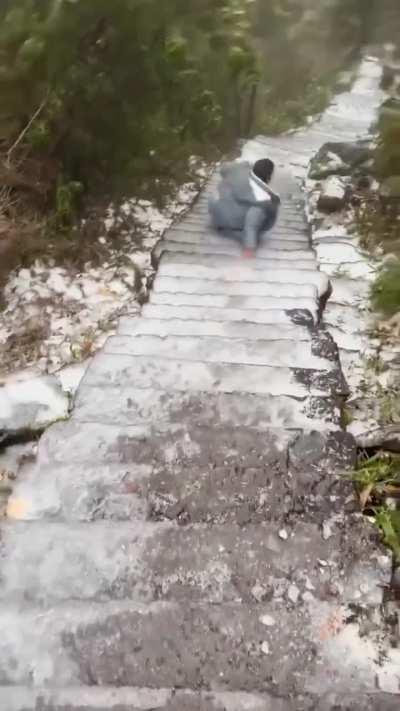 WCWG sliding on a snowy steps