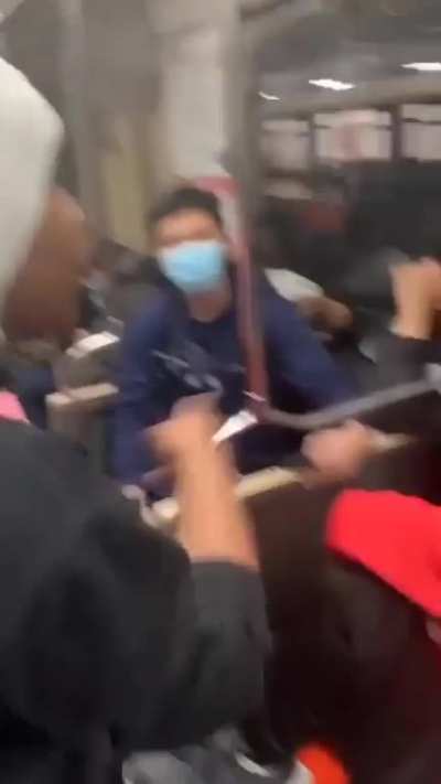Asian teen beaten and stomped by a racist pack of women.