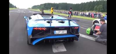 Idiot cameraman nearly gets himself run over