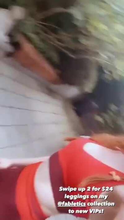 Madelaine Petsch in red and maroon spandex